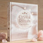 The book 'Crystal Rituals by the Moon' by Leah Shoman, published by Routledge. The image shows the book's front cover and spine against a clean white background.